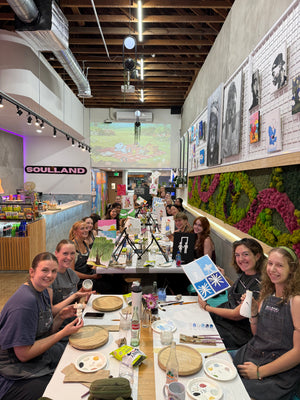 a group of friends painting at old towne orange 

